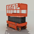 Electric powered self propelled scissor lift table